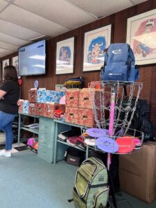 pick up your disc golf equipment at the barbershop in Gowrie Iowa